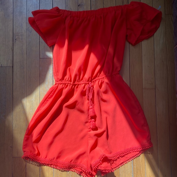 A red off the shoulders romper - Picture 1 of 2